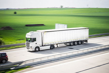 White TIR Truck in Motion Driving on Highway thumbnail