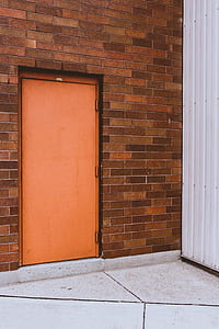 closed brown wooden door thumbnail