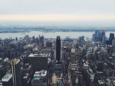 aerial view photography of assorted-color concrete buildings at daytime thumbnail