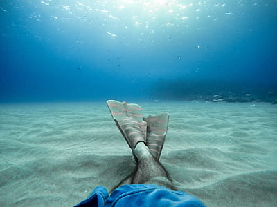 person wearing flippers underwater thumbnail