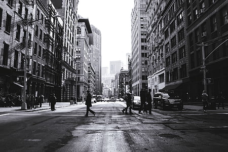 grayscale photography of people crossing road thumbnail