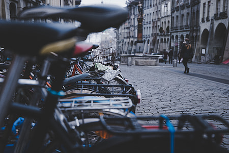 assorted city bicycle on gray concrete road thumbnail