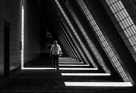 man walking inside the building thumbnail