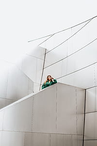 woman standing on tile covered stairs thumbnail