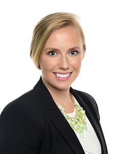 woman in black blazer smiling thumbnail