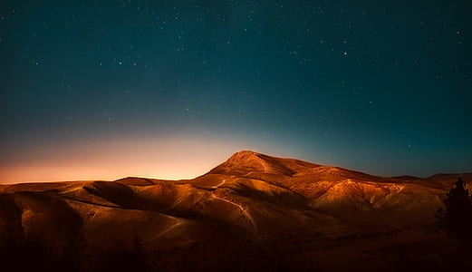 silhouette photography of mountain thumbnail
