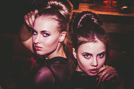 two women standing portrait photo thumbnail