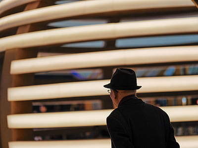 man wearing black fedora hat thumbnail