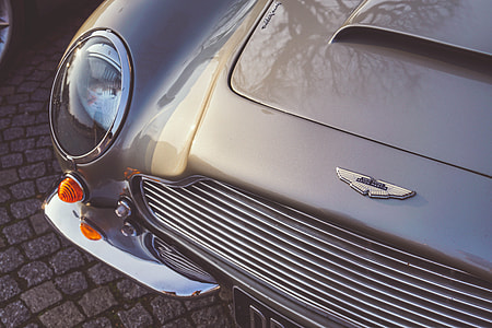 selective focus photo of classic silver Aston Martin vehicle thumbnail