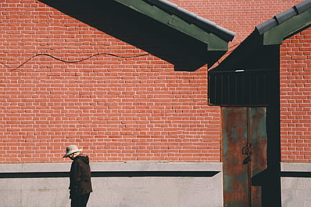 person standing near the house thumbnail