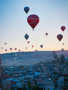 hot air balloons above Cappadocia at daytime thumbnail