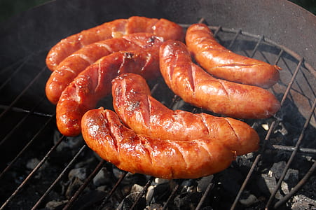 grilled sausage on charcoal grill thumbnail