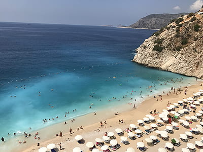 aerial view photography of group of people at beach thumbnail