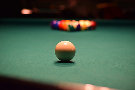 white billiard ball in selective focus photography thumbnail