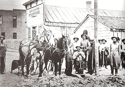 Early settlers plow the road for Main Street in Blackfoot, Idaho thumbnail
