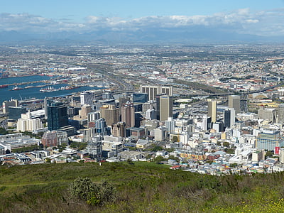 aerial photography of concrete buildings near body of water at daytime thumbnail