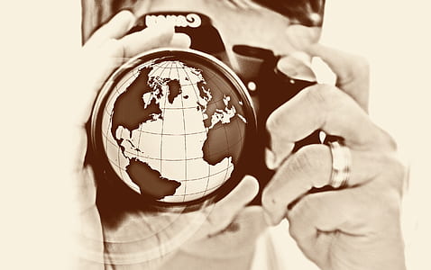 sepia man holding camera thumbnail
