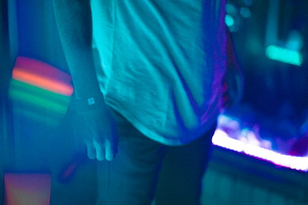 person wearing gray top and black bottoms thumbnail