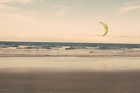 person parasailing during day time thumbnail