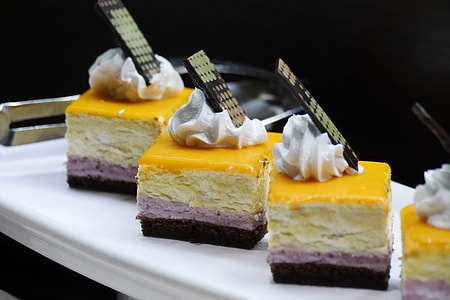 cooked pastry on ceramic plate close-up photo thumbnail