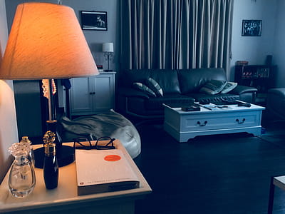 Black Table Lamp Base With Cone-shaped Brown Lampshade on Brown Wooden Nightstand thumbnail