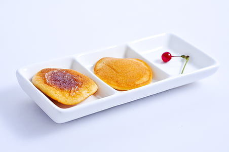 three slotted tray with pancakes and cherry thumbnail