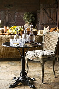 wine table in front of empty chair thumbnail
