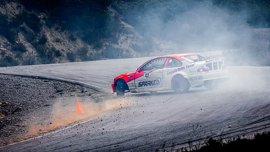 white and red car on road thumbnail