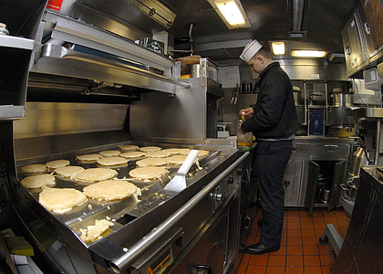 man in front of griddle thumbnail