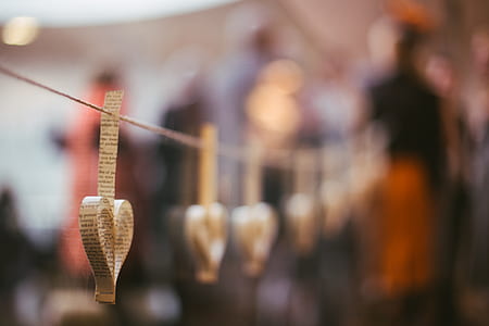 selective focus photography of heart hanging decor at daytime thumbnail