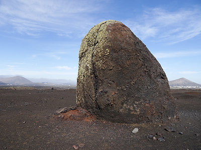 photo of brown rock on brown dessert runes during day time thumbnail