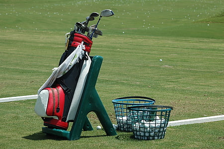 red and black leather golf bag on ground thumbnail