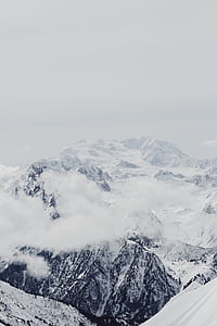 aerial photography of mountains covered with snow thumbnail