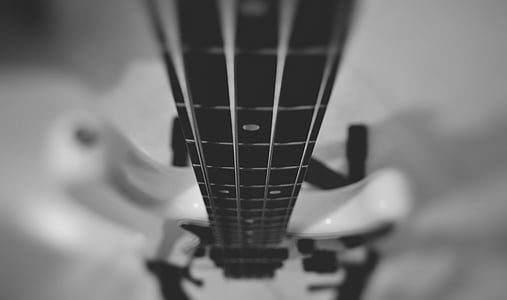grayscale photography of bass guitar thumbnail
