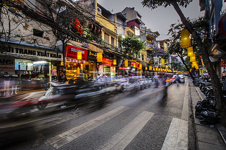 time lapse photo of vehicles on street thumbnail