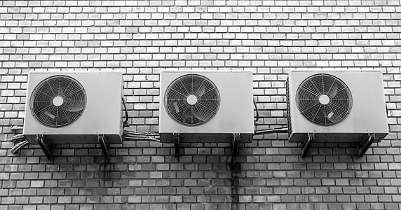 three wall mounted gray outdoor AC unit thumbnail