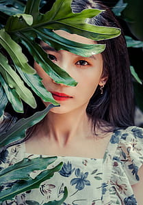 Woman In Floral Print Top thumbnail