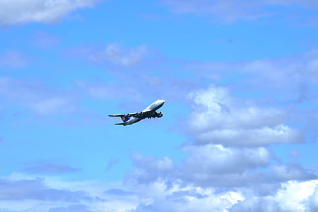 white airplane on sky thumbnail