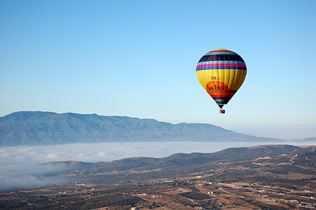 hot air balloon flying during daytime thumbnail