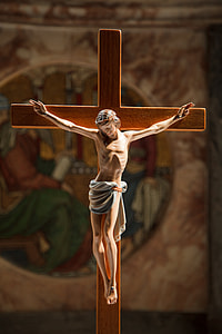 Crucifix decor with ray of light inside room thumbnail