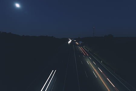 time-lapse photography of road at night thumbnail
