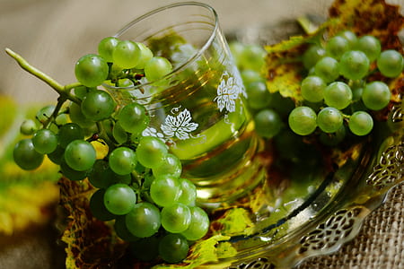 green grapes beside glass thumbnail