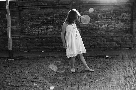 grayscale photography of girl in white dress thumbnail