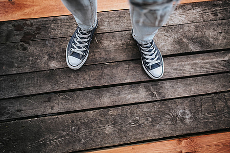 Blonde woman having a healthy snack at the wooden pier thumbnail