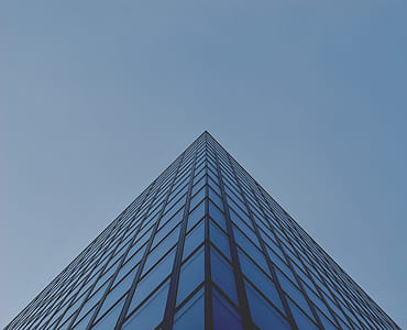 gray window curtain building at daytime in low angle shot thumbnail