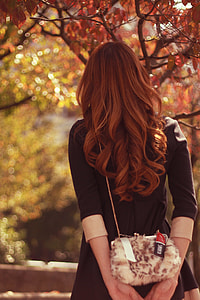 woman wearing brown long sleeved  dress with crossbody bag thumbnail