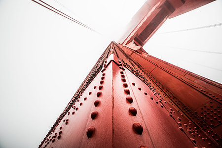 Pillar of The Golden Gate Bridge Against Foggy Sky thumbnail