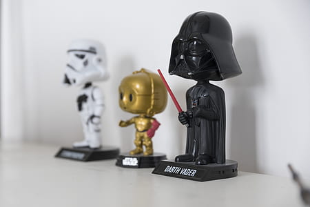 Star Wars Darth Vader, C-P30, and Stormtrooper bobblehead figurines on table thumbnail