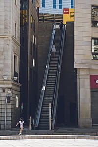 Girl Walking Towards the Escalator thumbnail