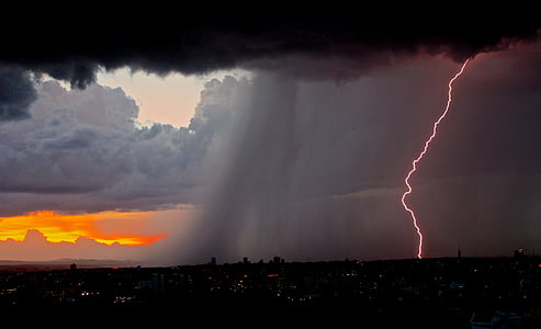 rain and lightning bolt at city thumbnail